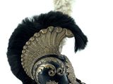 an image of a helmet with feathers on a white background