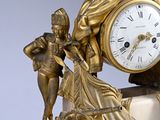 a clock that is sitting on top of a table