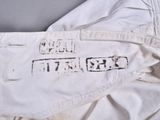 a close up of a piece of clothing with a tag on it