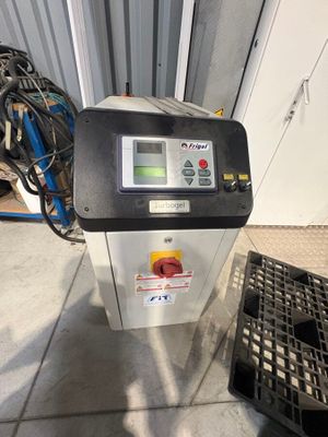 an image of a machine that is sitting on the ground