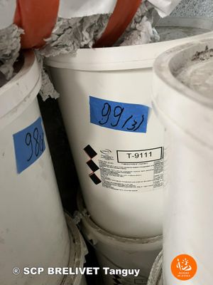 several buckets of cement sitting next to each other on a shelf