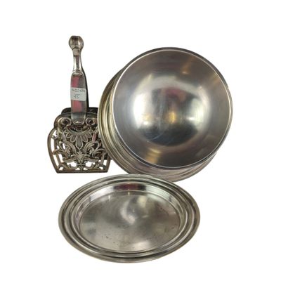 a silver plate with a bottle of wine in it