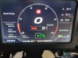 a motorcycle dashboard with a speedometer on it