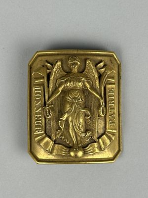 une image représentant une médaille d'or sur laquelle figure un ange