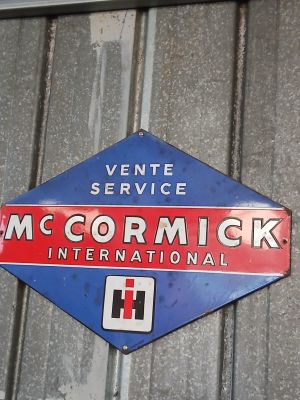 a sign that says mccormick international on the side of a building