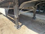 a close up of a flatbed truck with a flat bed