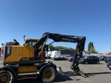 the back end of a volvo construction vehicle parked in a parking lot
