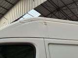 a white van that is parked in a building