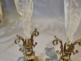 two champagne glasses sitting on top of a table