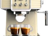 two cups of coffee being poured into a coffee machine