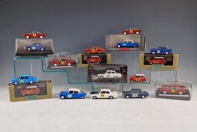 a lot of toy cars that are in a display case
