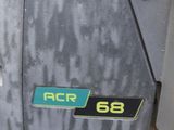 a close up of a motorcycle with a number plate on it