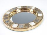 a mirror that is sitting on a table