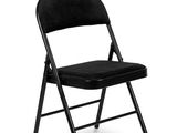 a black folding chair on a white background