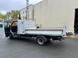 a truck that is parked in front of a building
