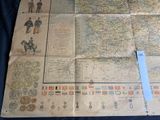a map of the world on a table with a ruler