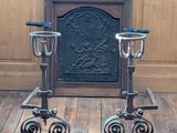 pair of antique cast iron bar stools on cast iron wheels