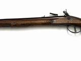an old rifle on a white background with a white background