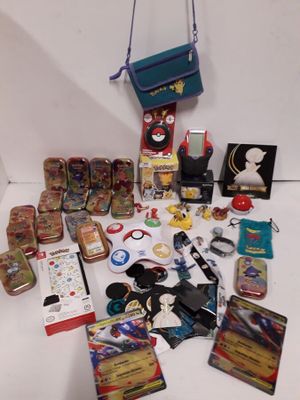 Important lot pokemon (console portable, boite metal vide, f… - Photo 1