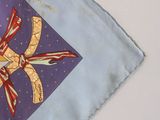 a flag with a design on it on a table