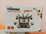 a box that has a pot of food on it