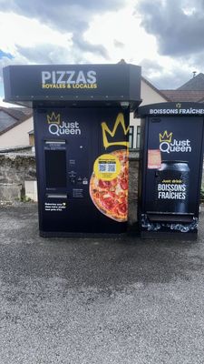 two vending machines on the side of the road