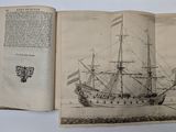 an open book with a drawing of a ship on it