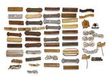 many different types of hair clips on a white surface