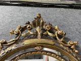 a mirror that is sitting on the wall