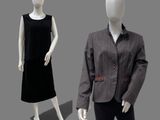 two mannequins dressed in black and grey clothing standing next to each other