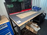 an image of a workbench with tools on it