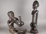 paire de figurines africaines en bois sculpté représentant un homme et une femme