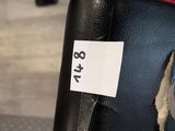 a close up of a piece of luggage with a sticker on it