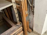 several pieces of wood are stacked on top of each other in a room