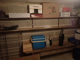 a shelf that has a cooler on it in a room