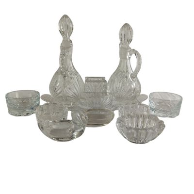 a picture of a group of glass items on a white background