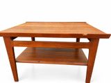 an image of a wooden table with a shelf on top of it