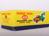 a yellow box with a picture of a dump truck on it