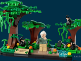 a lego model of a man and a woman in a forest