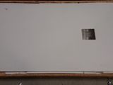 a picture of a piece of white paper on the floor