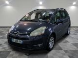 a picture of a blue citrole parked on a checkered floor