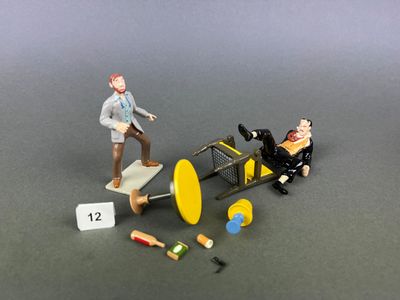 deux figurines représentant un homme et une femme dans un avion