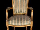 an image of a chair with a striped upholstered seat