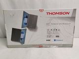 a boxed box of a laptop computer on a white surface