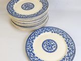 six blue and white plates with floral designs on them