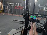 an image of a gym room with equipment in it