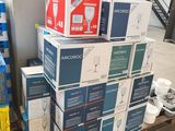 boxes stacked on top of each other on a pallet in a warehouse