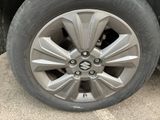 a close up view of a tire on a car