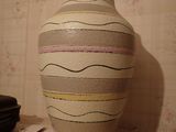 a vase that is sitting on top of a table