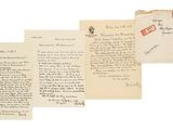 a group of old letters and envelopes with stamps on them